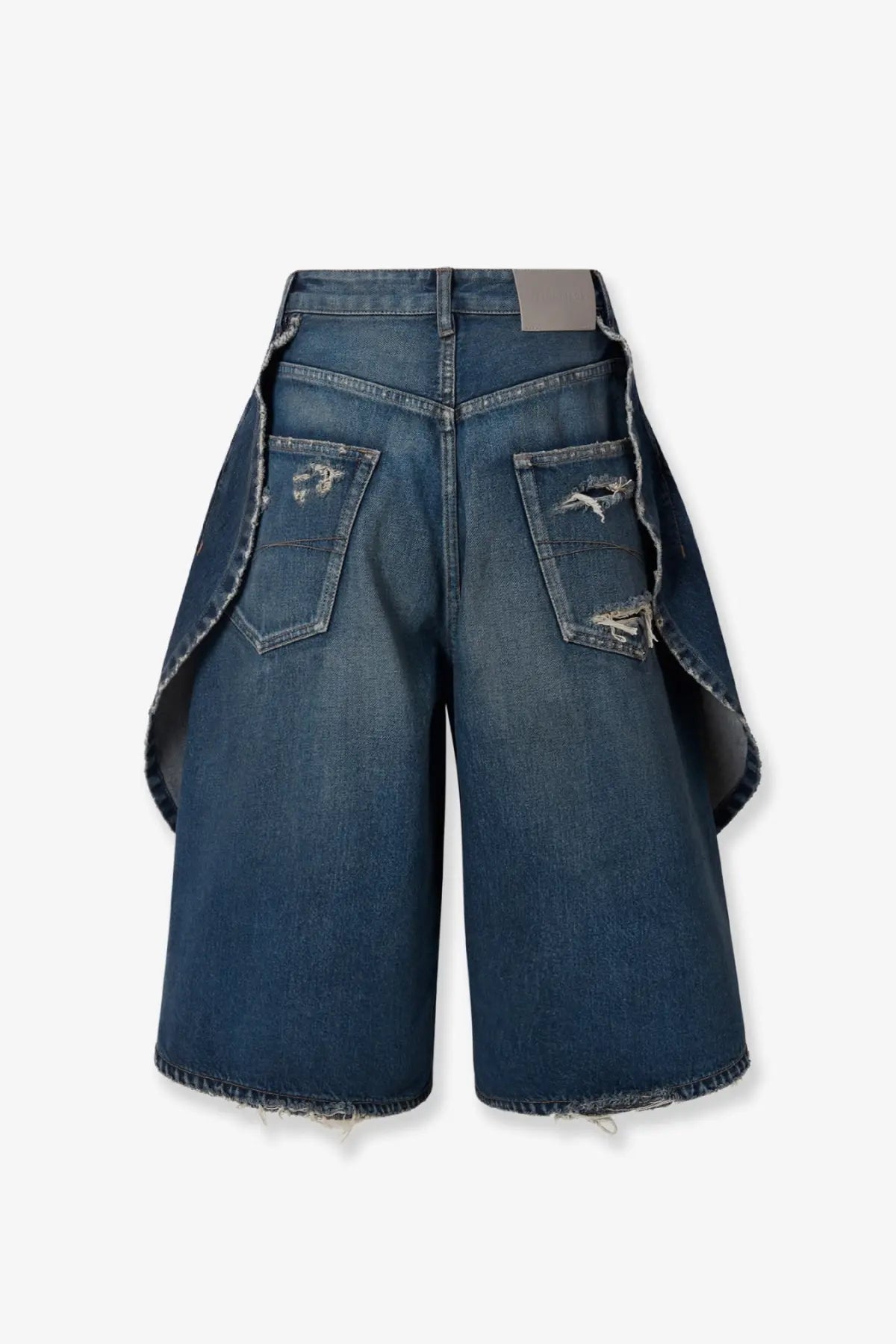Balenciaga women’s blue cotton denim bermuda shorts with distressed frayed edges and asymmetrical overlapping panels