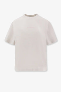 Balenciaga women’s off-white cotton shirt with short sleeves and faintly embroidered logo across the chest