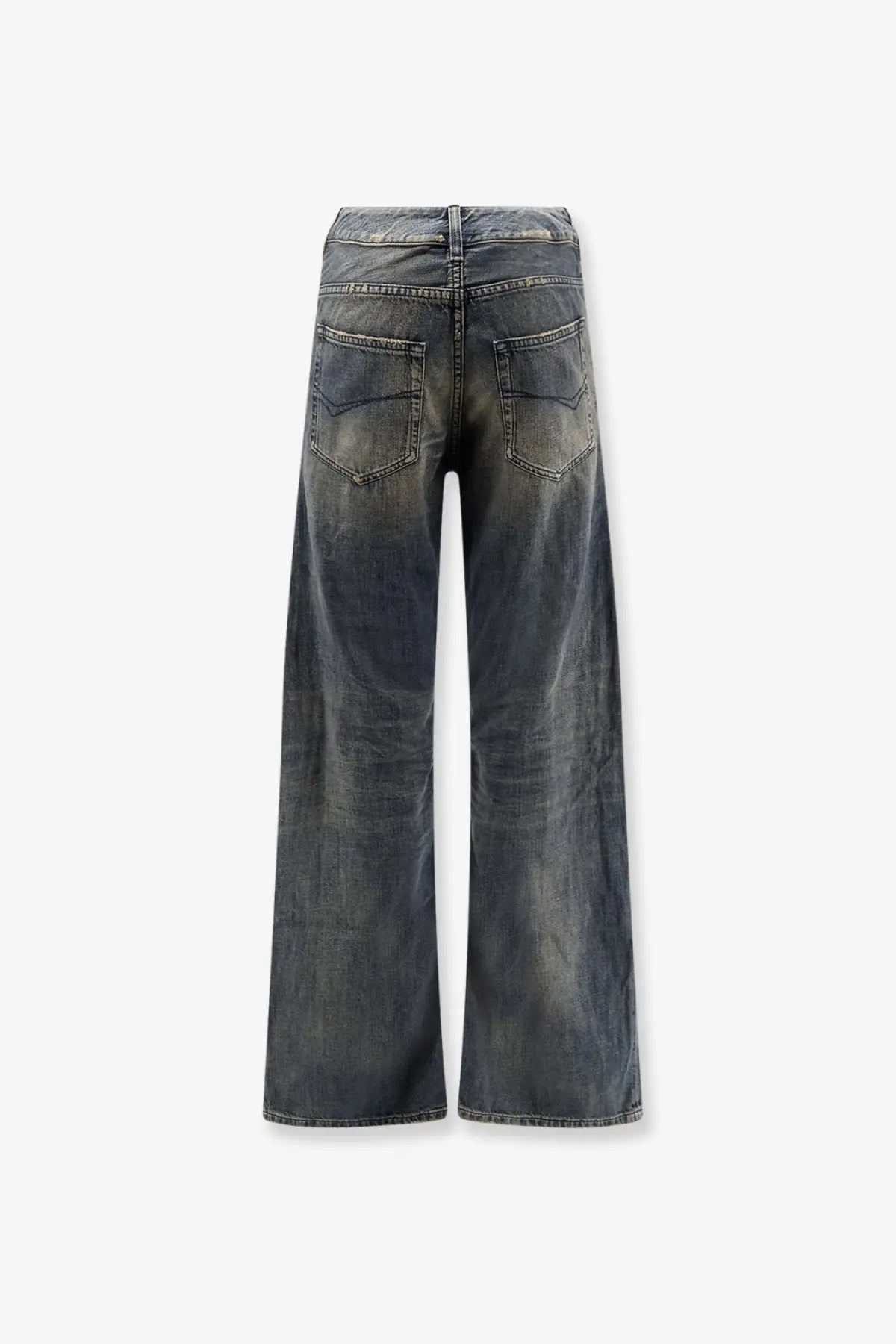 Balenciaga women’s curved waist dark-wash denim jeans in blue with wide-leg cut and faded distressed details
