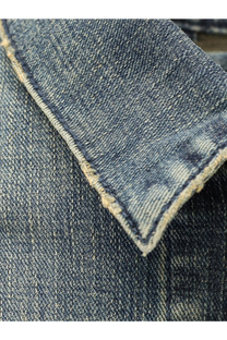 Balenciaga women’s blue denim jacket collar with worn frayed edges and visible stitching detail