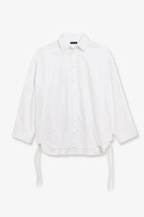 Balenciaga women’s white cotton button-down shirt with loose fit and tie-side details for stylish layering