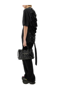 Balenciaga women’s lace up shirt black paired with black patent leather Balenciaga city bag with silver hardware and dual handles