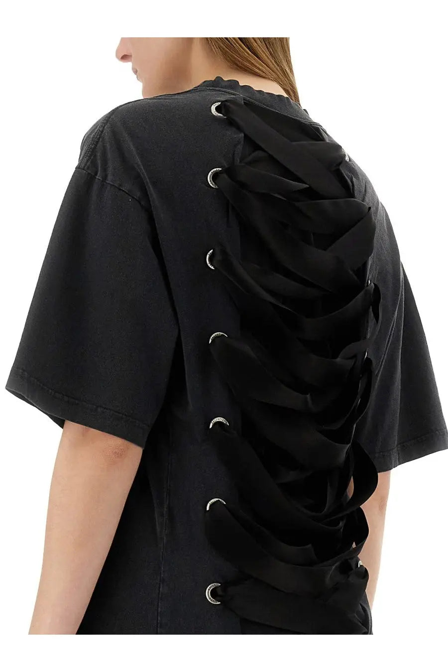 Back view of balenciaga women’s black short-sleeved lace-up shirt with layered fabric strips and silver eyelets
