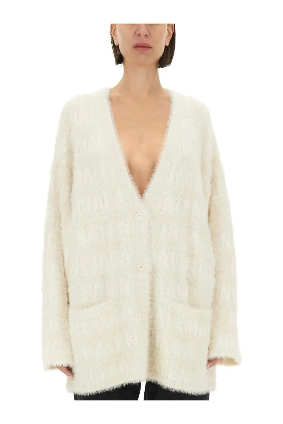 Balenciaga women’s cream-colored fluffy knit cardigan with deep v-neck and front pockets in white cream color