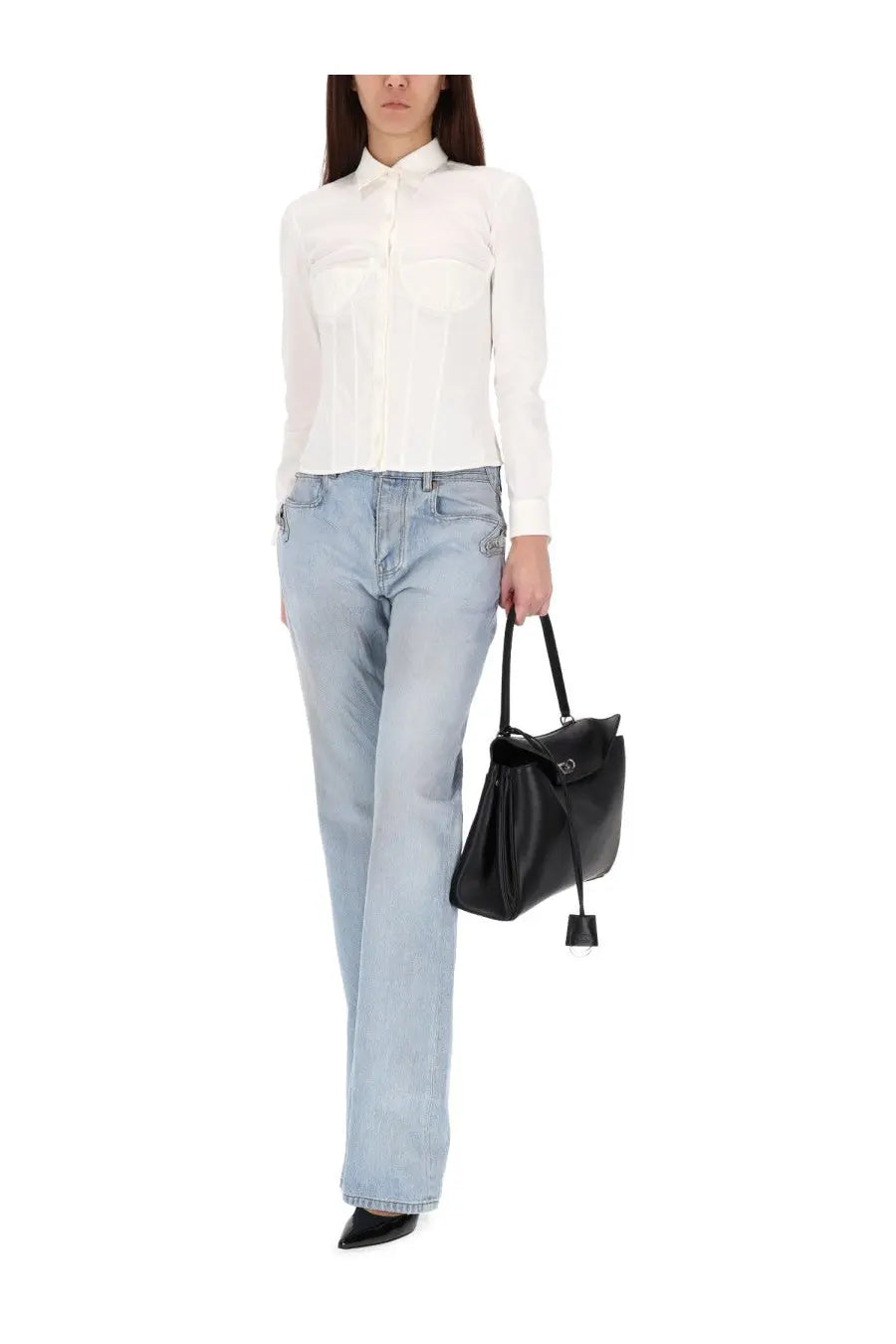 Black leather handbag with structured shape and top handle paired with balenciaga women’s city blue pants