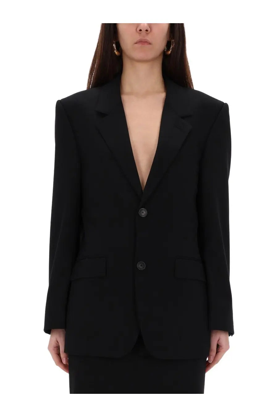 Balenciaga women’s sartorial jacket in black featuring a structured blazer design with bold oversized shoulders and two front buttons