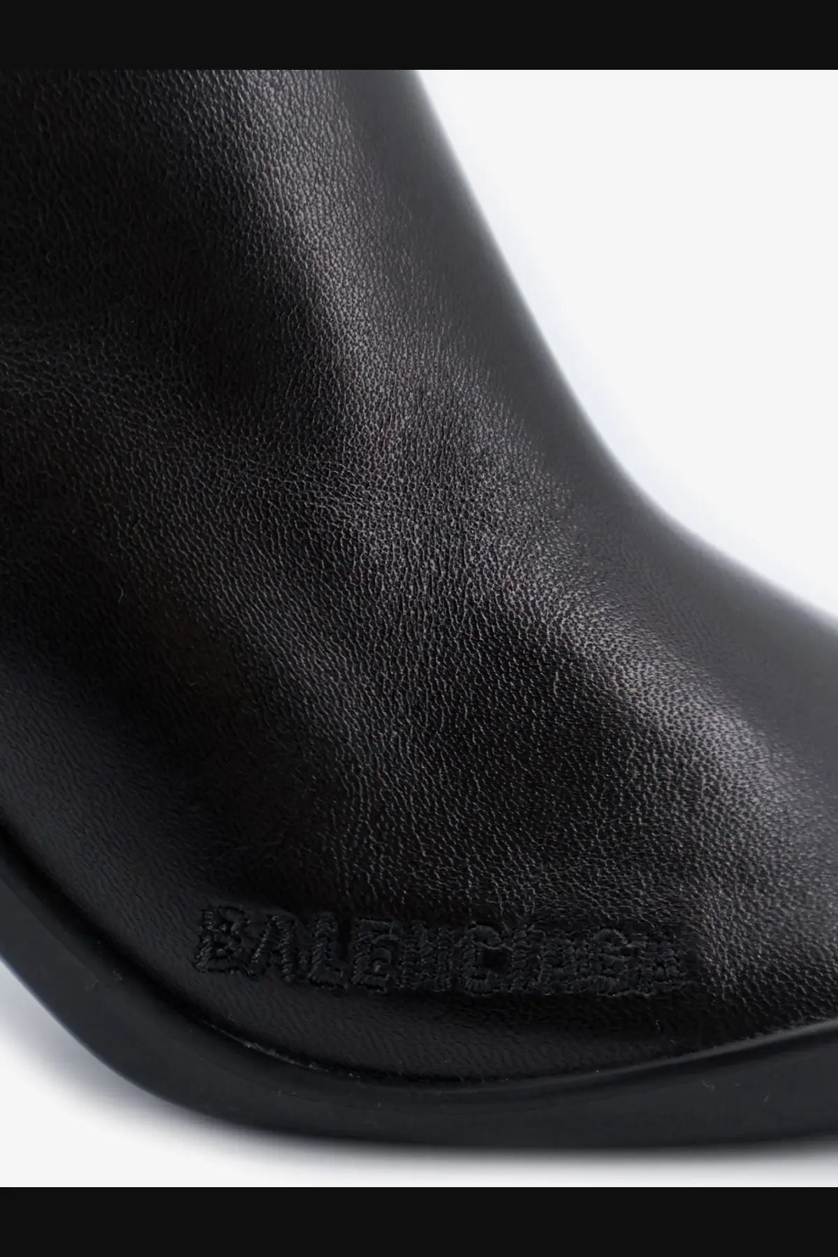 Balenciaga women’s shibuya black leather boot with embossed branding on the side for stylish wear