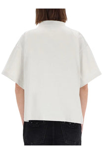 Balenciaga women’s white oversized short-sleeved shirt with relaxed fit and clean collar in lightweight fabric