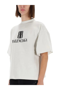 White Balenciaga women’s oversized t-shirt with black logo and bold lettering on front in cotton fabric