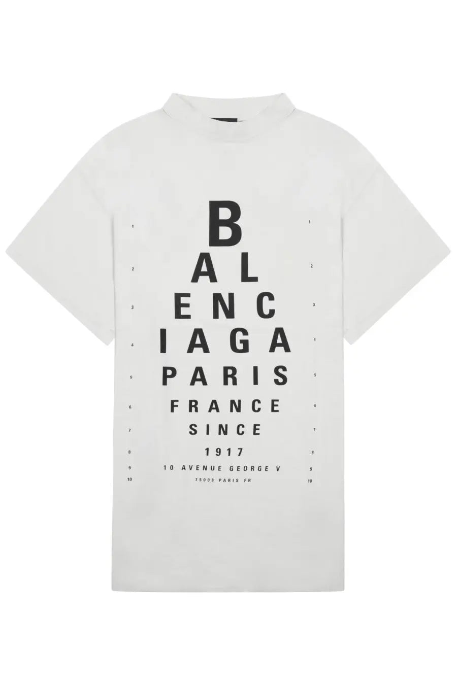 White Balenciaga women’s shirt featuring a bold black eye chart print with brand name and founding details