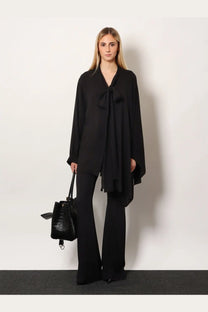 Balenciaga women’s black silk blouse with draped bow neckline in black satin fabric
