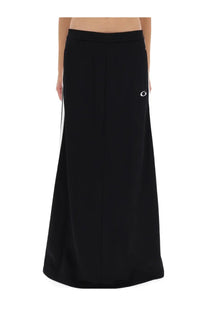 Balenciaga women’s black athletic maxi skirt with white side stripe and small embroidered logo on the hip