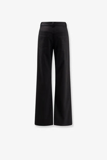 Balenciaga women’s stretch wool black trousers with wide-leg silhouette and subtle stitching details