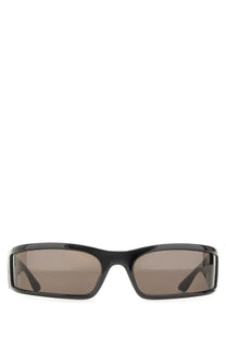 Balenciaga women’s sunset rectangle sunglasses with black frames and dark gray lenses for stylish sun protection