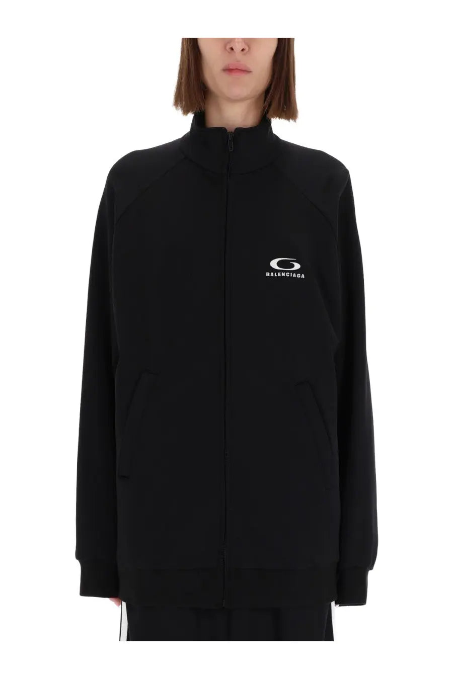 Balenciaga women’s black zip-up track jacket with white logo on left chest for casual wear
