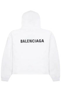 Balenciaga women’s white sweatshirt showing the back with bold black lettering across the hoodie