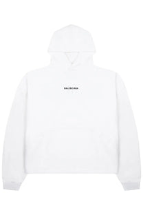 Balenciaga women’s white hoodie with minimalist black logo across the chest in soft cotton material
