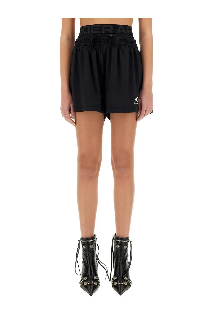 Balenciaga women’s under armour running shorts in black with elastic waistband and subtle logo detailing