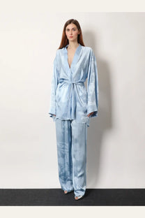 Light blue satin robe and matching wide-leg pants set with subtle abstract pattern by balenciaga women