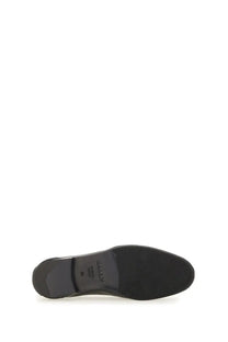 Black leather sole of bally women’s moccasin plume black with textured rubber outsole and embossed brand logo