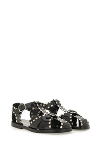 Bally women’s black leather sandals with silver-toned studs and buckle details