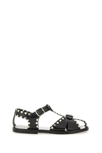 Bally women’s black patent leather t-strap sandal with silver stud embellishments