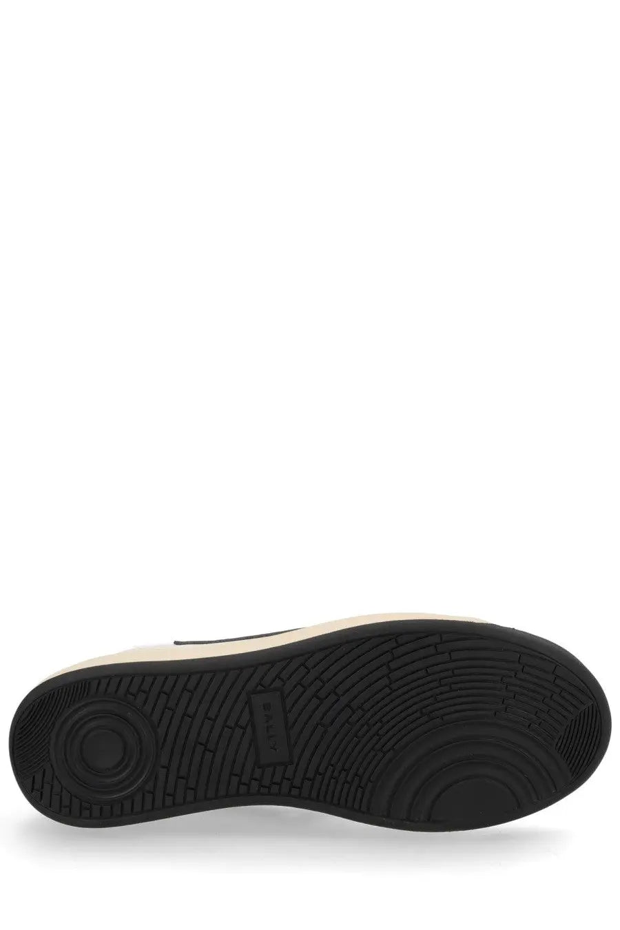 Black rubber sole with circular textured tread and beige midsole of bally women’s sneaker competition white
