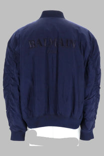 Navy blue balmain men’s bomber jacket with quilted sleeves and ribbed cuffs in con ricamato blue style