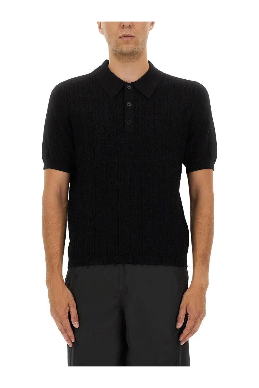 Balmain men’s black ribbed knit polo shirt with classic collar and button placket in knitted fabric
