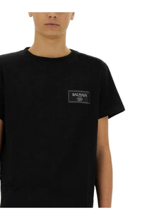 Balmain men’s black cotton couture short-sleeved t-shirt with rectangular embroidered logo patch on chest