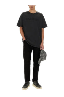 Balmain men’s black oversized t-shirt with subtle embossed logo across the chest in soft cotton material