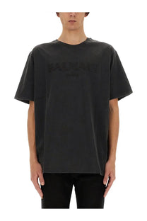 Black balmain men’s t-shirt with faded embossed logo across chest in soft grey cotton fabric