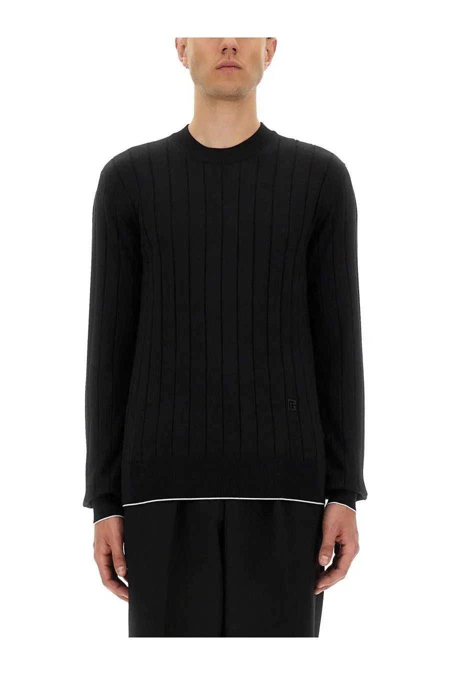 Balmain men’s silk and cotton knit black sweater with white trim on hem and cuffs in ribbed fabric