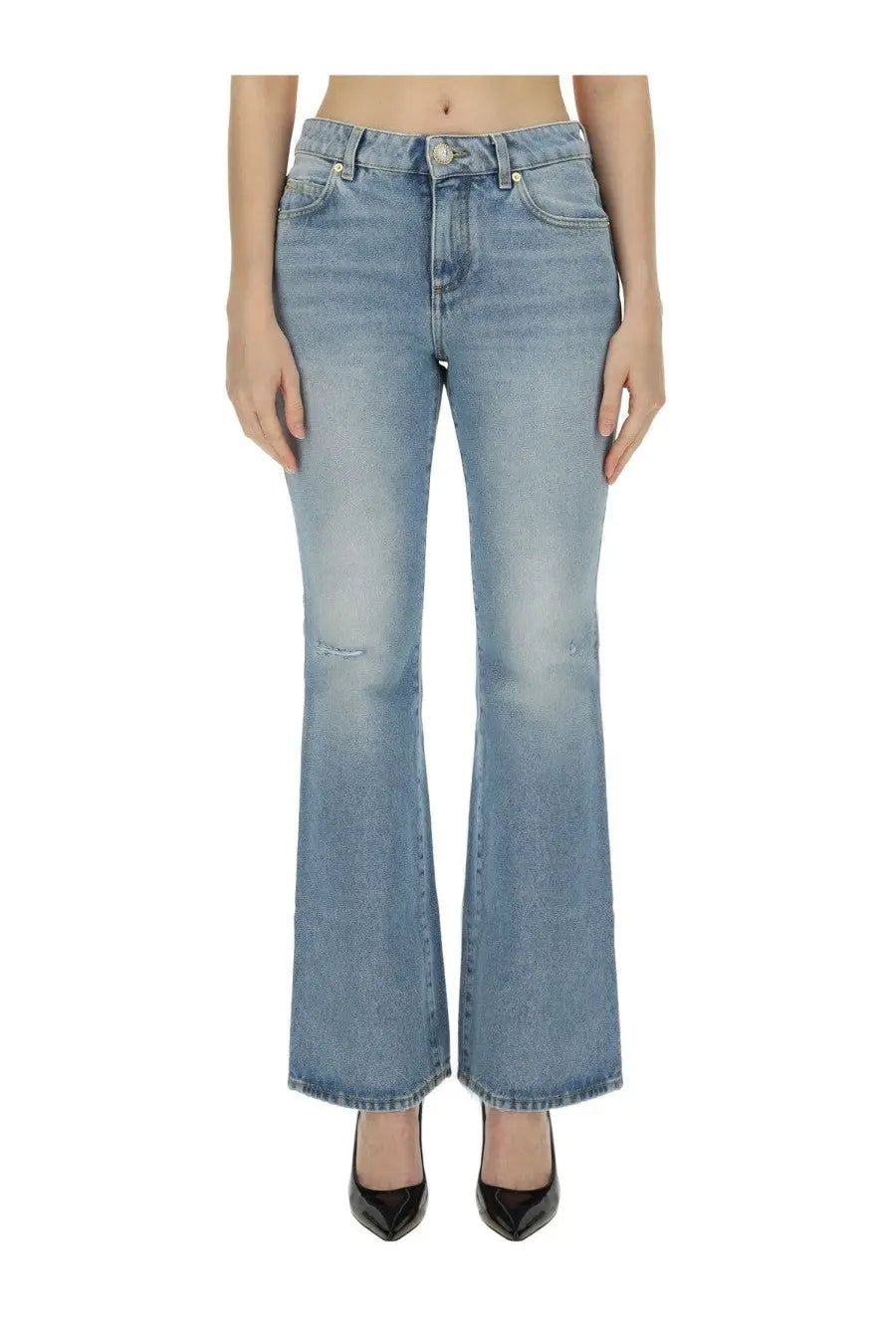 Balmain women’s blue light-wash denim flare jeans with subtle distressing at the knees