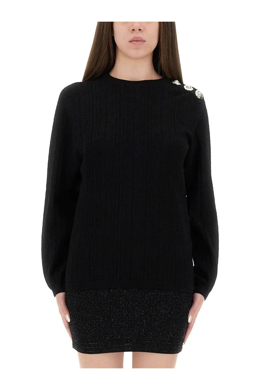 Balmain women’s black ribbed knit sweater with silver button shoulder embellishments and contrasting textured hem