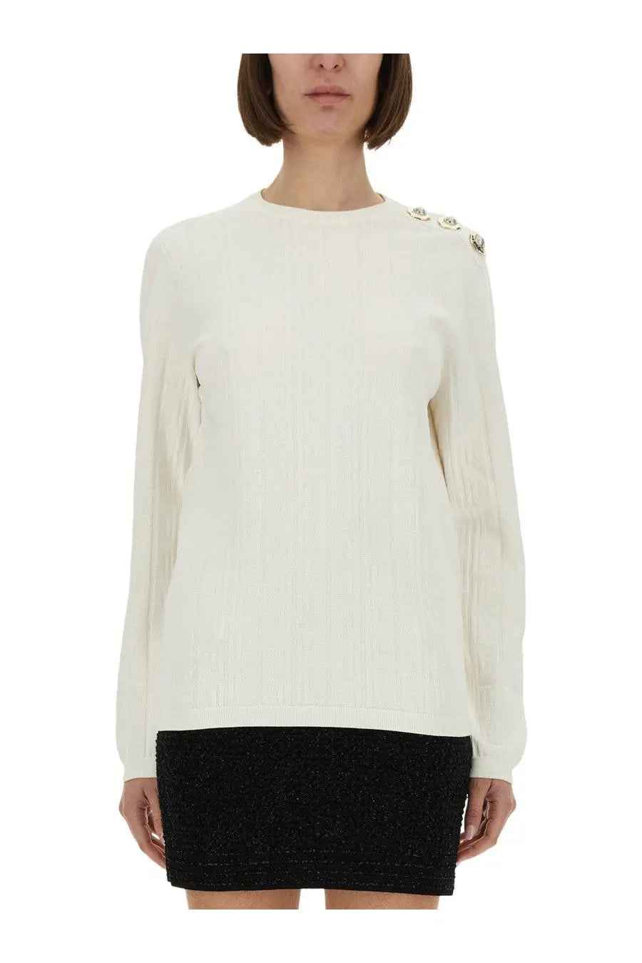 Balmain women’s cream-colored knitted long-sleeved sweater with decorative silver shoulder buttons in white