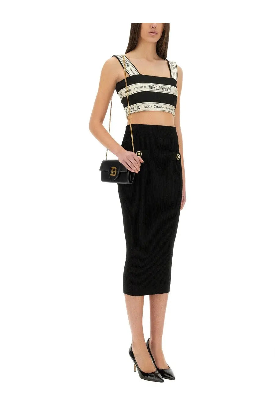 Black ribbed midi skirt with gold tone button details paired with balmain womens top short multicolor