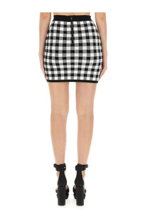 Balmain women’s multicolor black and white checkered mini skirt with black waistband ideal for stylish casual wear