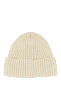 Cream-colored ribbed knit baracuta men’s beanie hat with folded cuff in white for cold weather use