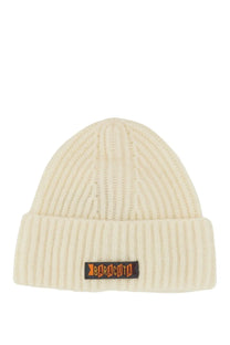 Cream-colored ribbed knit baracuta men’s beanie hat with folded cuff and orange logo patch
