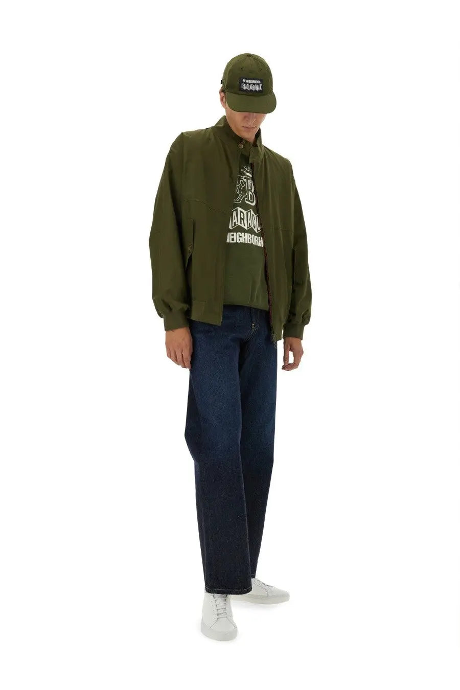 Olive green patagonia cap with black embroidered logo patch complementing baracuta men’s jacket green