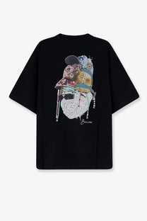 Black oversized barrow men’s cotton t-shirt featuring a detailed beaded face graphic with ornate hat and jewelry