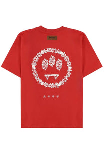 Red barrow unisex short-sleeved t-shirt featuring a white smiling face with fangs graphic and abstract circular border