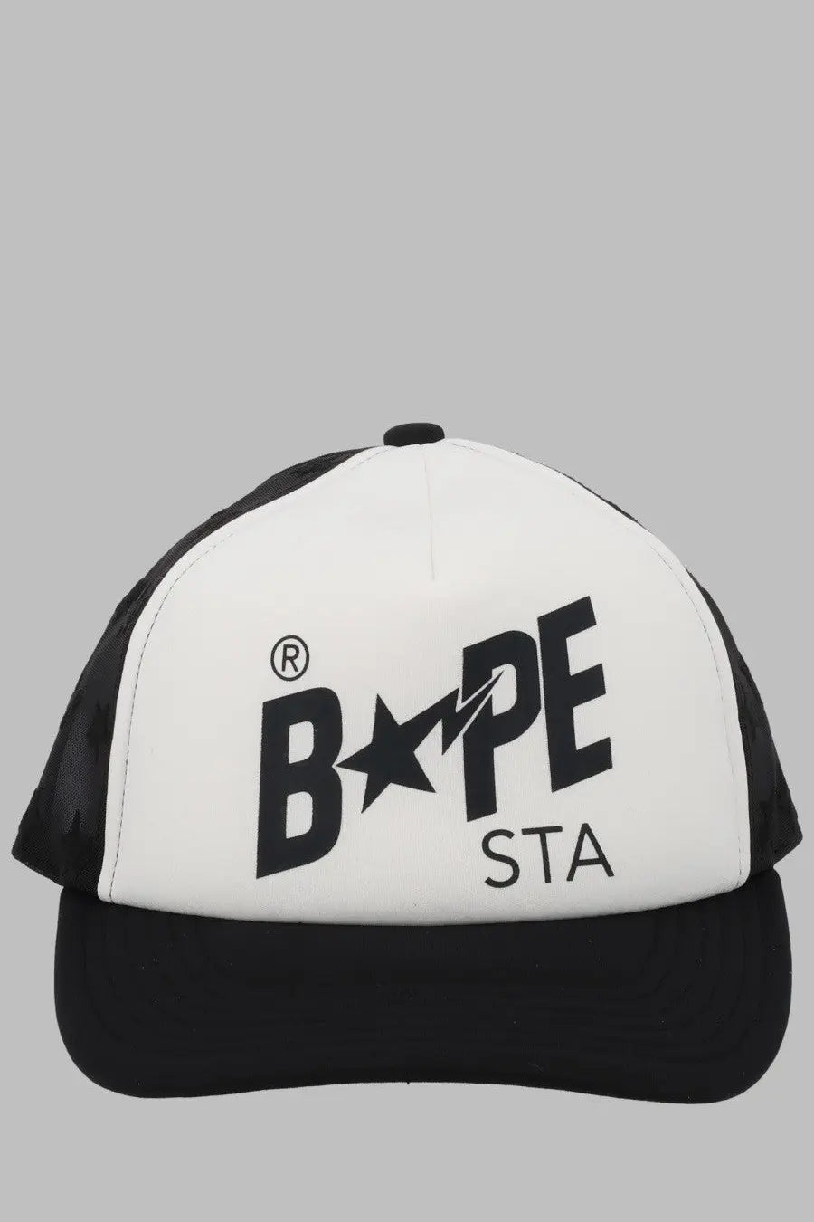 A bathings ape men’s black and white bape sta baseball trucker hat with bold logo on front panel