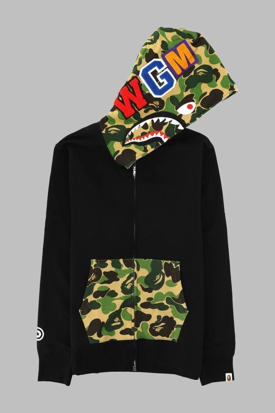A bathing ape men’s black zip-up hoodie with camo shark face hood wgm lettering and matching camo pocket