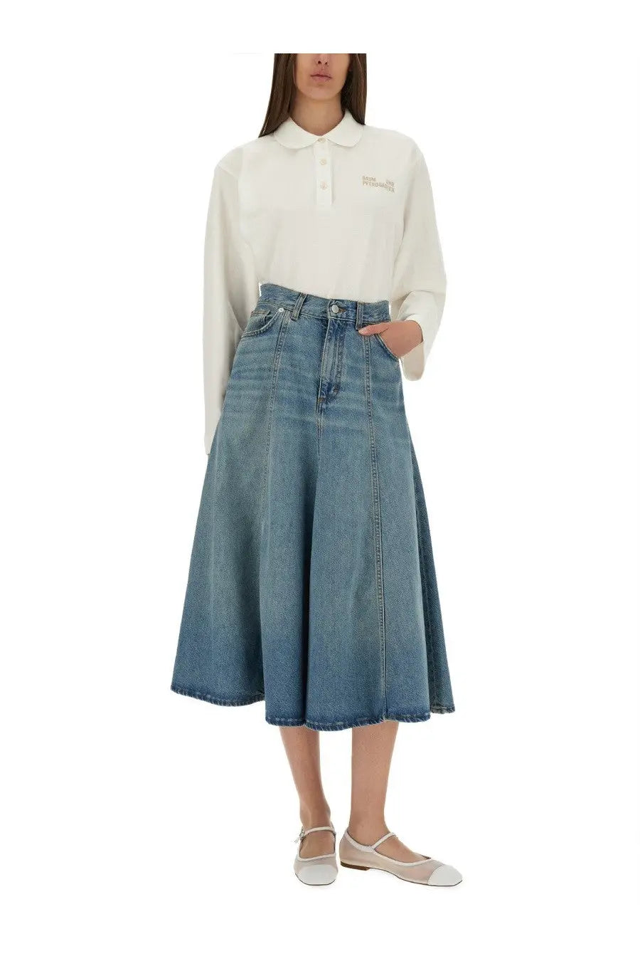 A high waisted medium blue denim skirt with a flared silhouette and raw hem for women by Baum und Pferdgarten