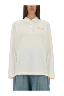 Off-white long-sleeved Baum und Pferdgarten women’s polo shirt with classic collar and subtle gold chest embroidery