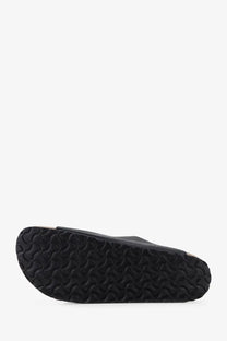 Black rubber sole with distinctive wavy tread pattern on birkenstock mens arizona leather sandals black
