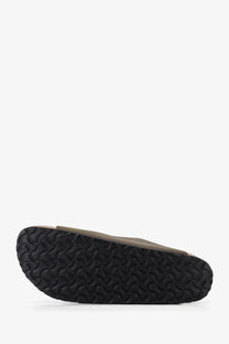 Birkenstock men’s Arizona leather sandals in olive green with black rubber sole and distinctive wavy tread pattern