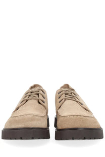 Beige suede Birkenstock unisex moccasin highwood moc lace low shoes with dark brown rubber soles and lace-up design
